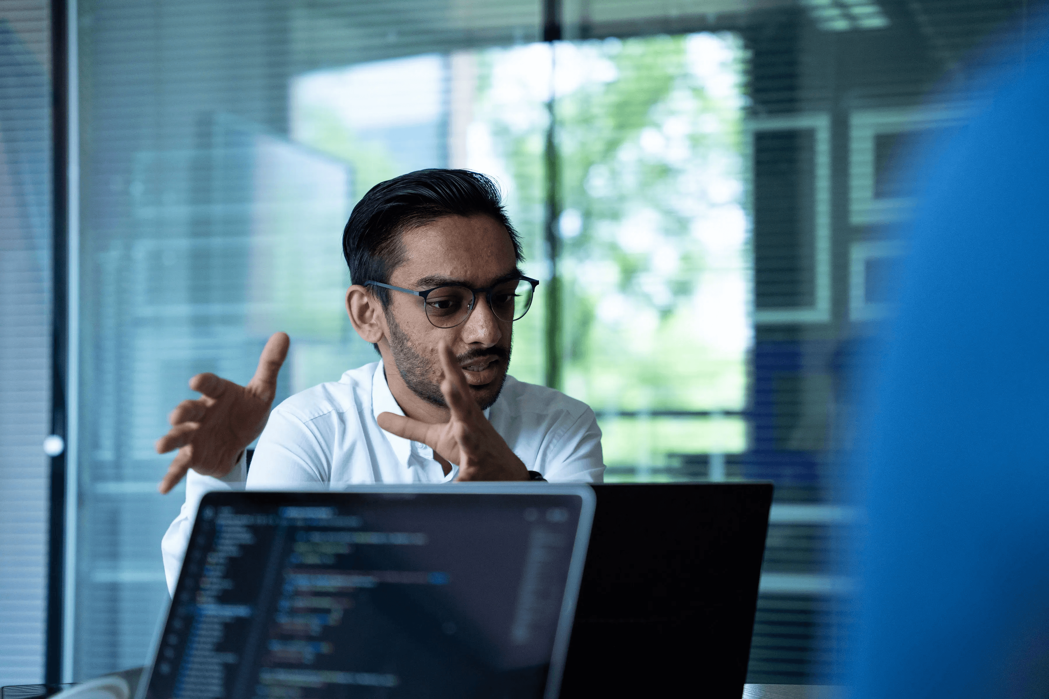 Man explaining concepts of code